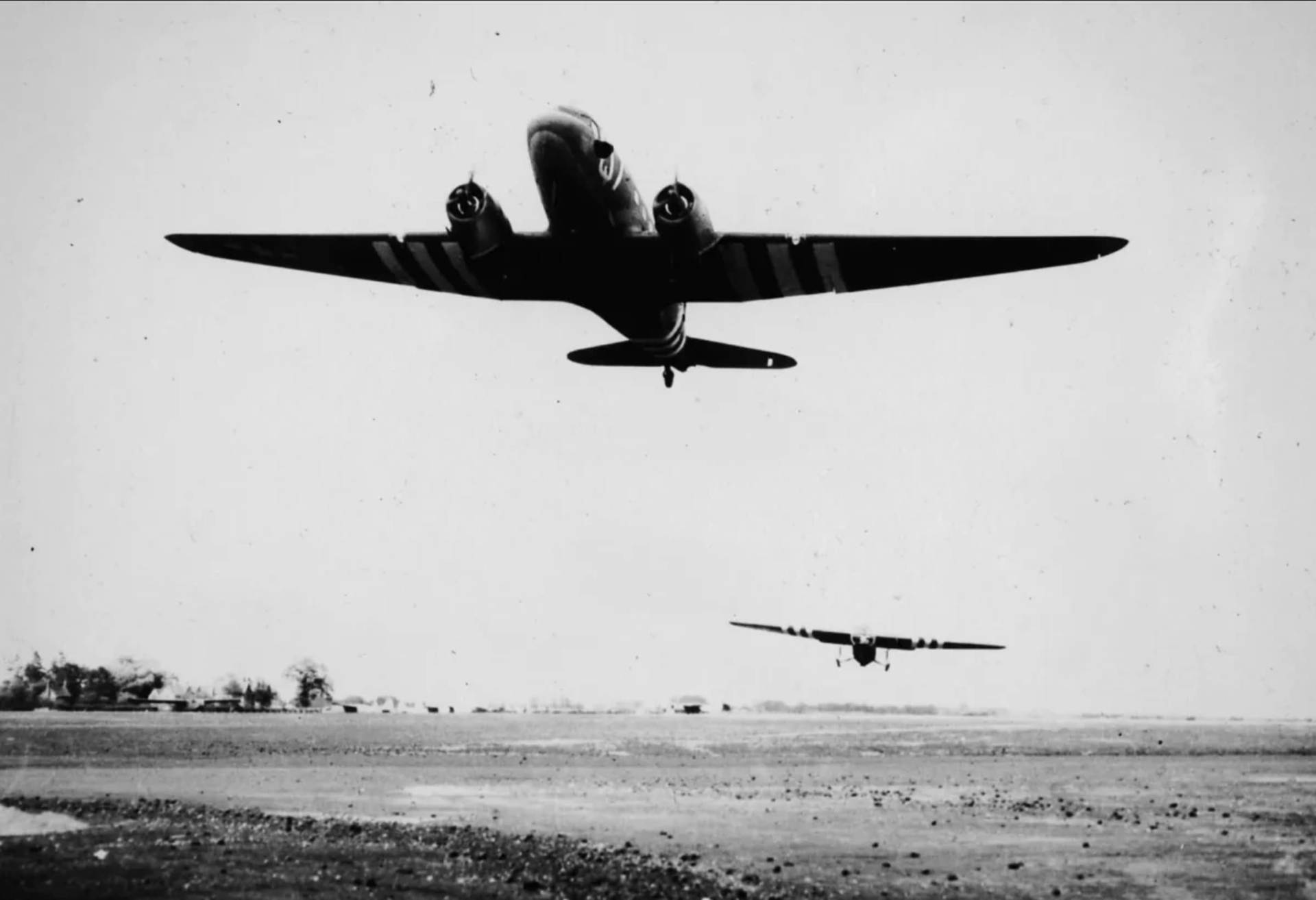 World War II transport aircraft That's All, Brother flying over an airfield