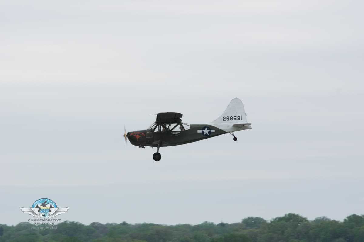 L-5 Flying above the trees