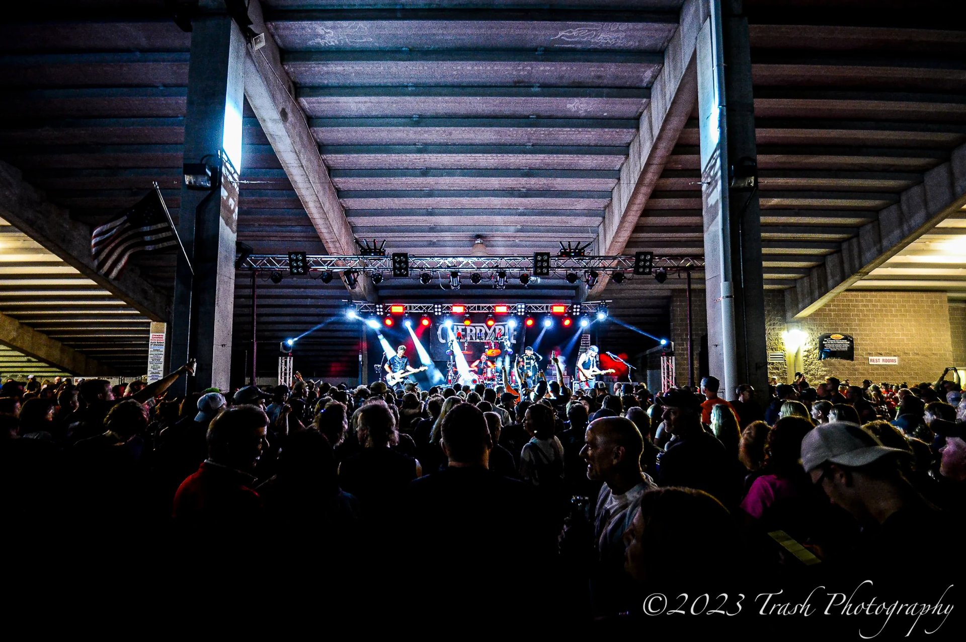 Cherry Pie playing on a stage with a large crowd