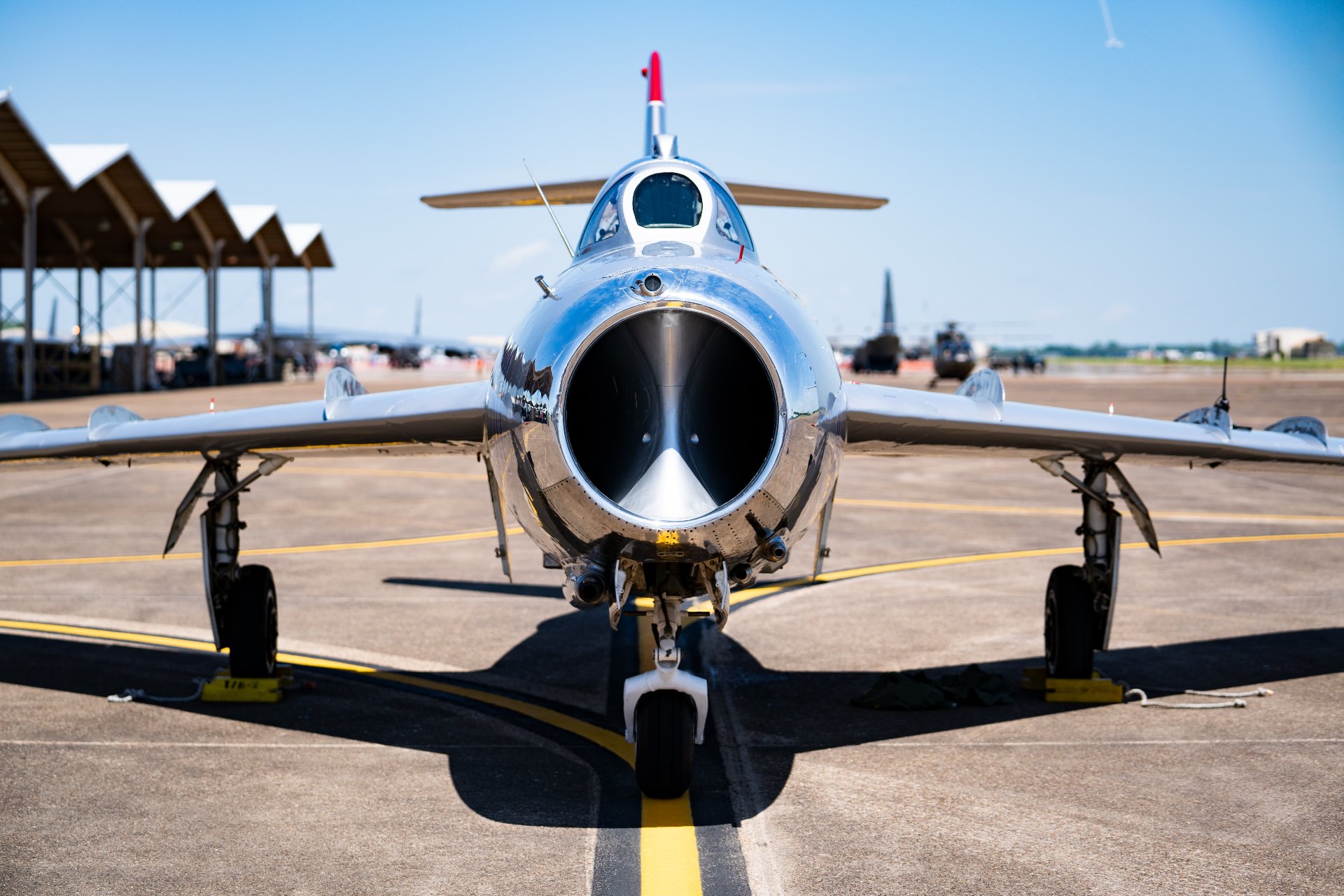 Front of a MiG-17F Jet sitting on a runway.