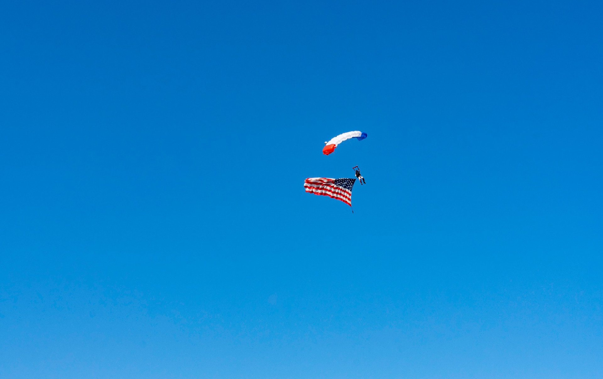 Skydiver in a clear blue sky